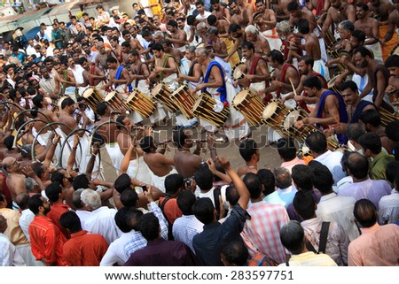THRISSUR, INDIA - APRIL 24 : Artists play Percussion wind instruments in the Pooram Festival held on April 24, 2010 in Thrissur, India. Thrissur Pooram is the most popular elephant pegeant of India