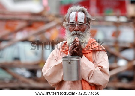 NASHIK - SEP 14:An unidentified Sadhu looks as he participates in the religious event Kumbh Mela on September 14, 2015 in Nashik, India.Kumbhmela is a Hindu religious event gathered by millions.