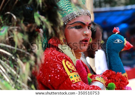 KOCHI, INDIA - AUG 19: An unidentified people dressed up as mythological characters participate in a cultural procession as part of Onam celebration held on August 19, 2015 in Kochi, Kerala, India.
