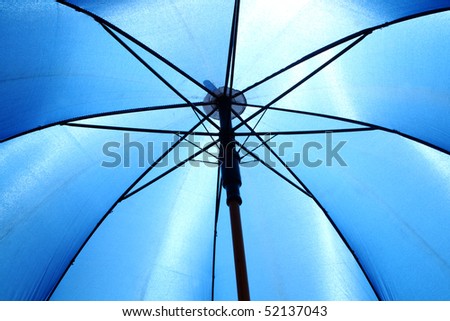 Close up bottom view of a blue  umbrella