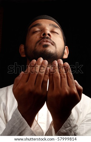 A Muslim praying in darkness - Bottom view