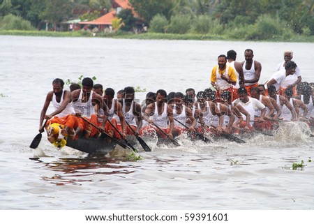 ALLEPPEY, INDIA - AUGUST 14 : A Snake boat team participating in the Nehru Trophy Boat race August 14, 2010 in Alleppey, India.