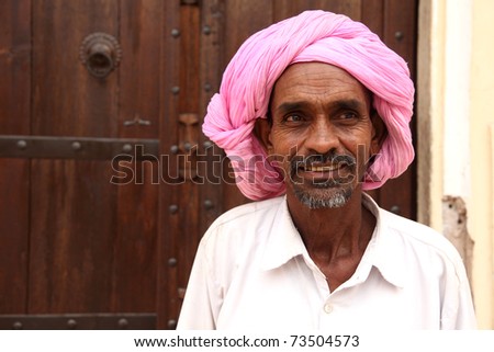 PUSHKAR, INDIA - NOVEMBER 17: A traditional Rajasthani man with turban at Pushkar on November 17, 2010. Pushkar fair is held annually in Rajasthan to trade camels, horses and cattle