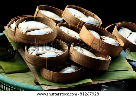 Cooked fish traditionally packed in bamboo bowls