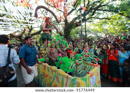 COCHIN, INDIA - JAN 01 : People dressed up as Adam and Eve parade during the Cochin Carnival New Year\'s day celebration on January 01, 2012 in Fort Cochin, Kerala, India.