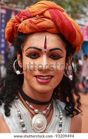 THRISSUR, INDIA - JAN 20: A Participant of the Kerala School youth festival looks after the event on January 20, 2012 in Thrissur . The week-long event is considered the Asia\'s largest youth festival.