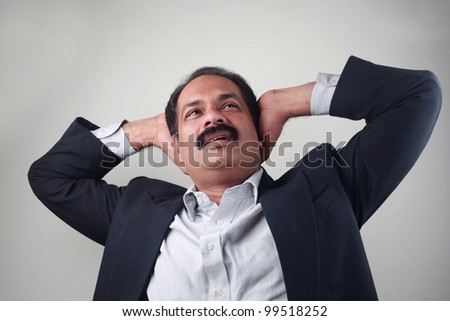 Indian business man with a worried expression