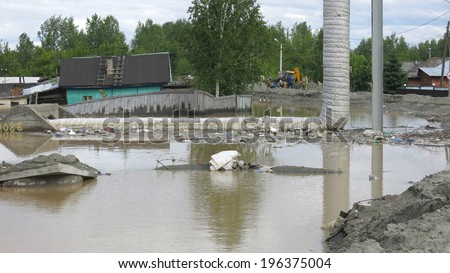 BIYSK, ALTAI  KRAI-JUNE 1: Flood water on the streets on June 01.2014 in Biysk, Altai krai. The city declared a state of emergency as floods tore into the city.