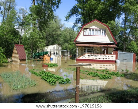 BIYSK, ALTAI KRAI-JUNE 1: Flood water on the streets on June 01.2014 in Biysk, Altai krai. The city declared a state of emergency as floods tore into the city.