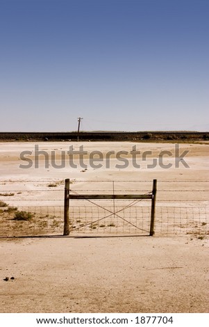 Fence in the Sale Lake in Summer in Utah with Clear Blue Skies
