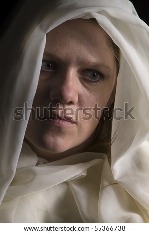 Close up on a Woman in Veil - Black Background