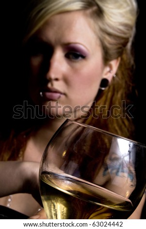 Close up on a Woman with Wine - Black Background