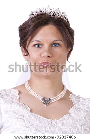 stock photo Hispanic Bride in white couture wedding dress Making a Funny 