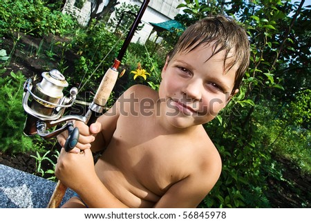 photos of the boy with a fishing rod in hand, soon to fishing. Processed using special effect it