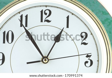 Almost one hour on big wall clock part isolated on white close up