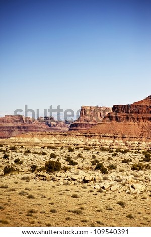 Utah Rock Formations. Utah State Rocky Drought Landscape. Vertical Photography. Clear Blue Sky Above the Utah, U.S.A.