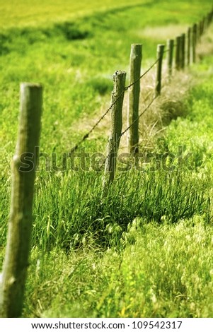 Country Fence - Farmland Country Wood Fence in Vertical Telephoto Photography.