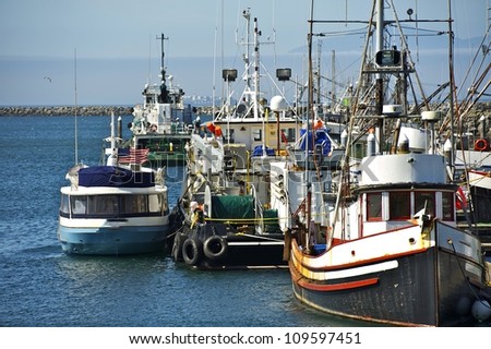 Small Pacific Harbor - Washington State, U.S.A. Small Aged Boats. Fishing Industry Photo Collection.