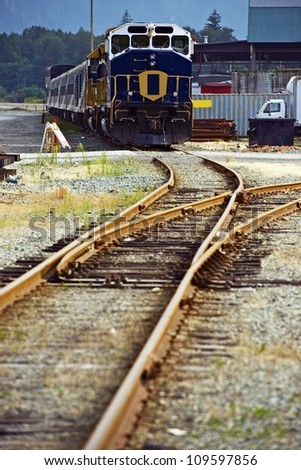Canadian Railroad Theme - Canadian Passanger Train. British Columbia, Canada. Vertical Photo.