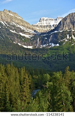 Glacier Waterfalls - Montana Rocky Mountains Landscape with Waterfall. Glacier National Park, Montana, USA.