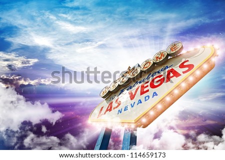 Welcome in Las Vegas - Illuminated Vegas Sign on Colorful Cloudy Sky.