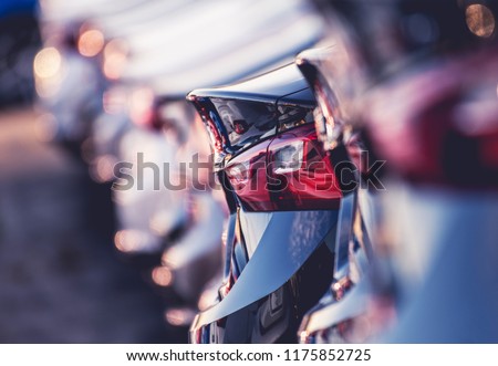 Automotive Industry Business Concept Photo. New and Used Cars on the Dealer Lot.