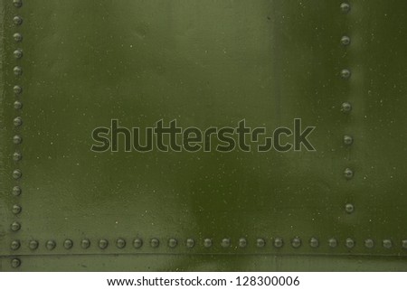 Green Metal with Bolt Heads Photo Background.