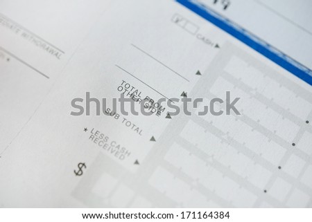 Bank Deposit Form - Total From Other Side Closeup. Blank Cash and Checks Deposit Form. Business and Banking Photo Collection.