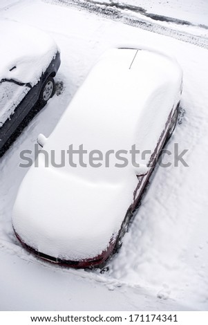 Car Under Snow. Parked Car Covered by Fresh Snow.
