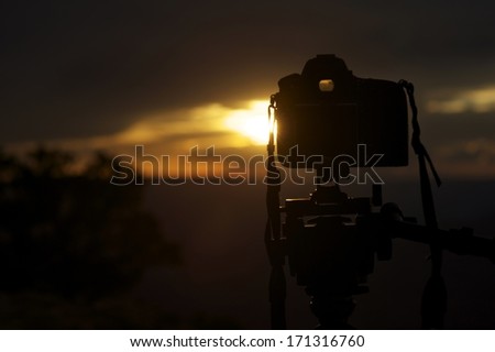 Sunset Photography. Digital Camera On Tripod In Sunset. Photography Theme.