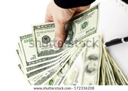 Cash In Hands. One Hundred American Dollars Bills in Hand.
