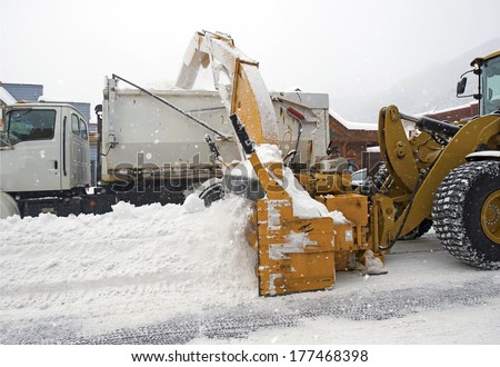Street Snow Removal by Heavy Equipment. Colorado Snow Removal.