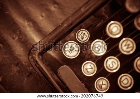 Aged Typewriter Closeup Photo. Sepia Color Grading.