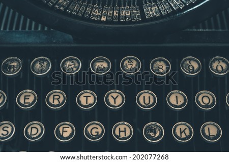 Retro Typewriter Closeup Photo. Vintage Damaged Typewriter