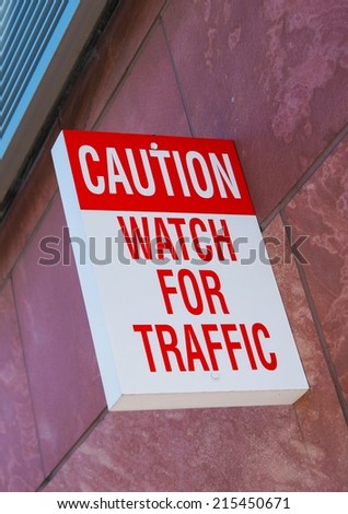 Caution, Watch For Traffic Wall Sign. Warning Sign