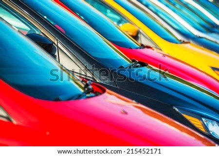 Modern Cars Stock Closeup. Colorful Cars Waiting For New Owners. Car Sales Industry.