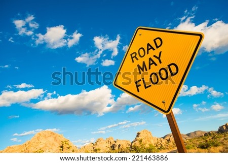Road May Flood Warning Sign in California Flash Flood Desert Area.