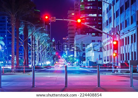 San Diego City Center Intersection at Night. Red Lights Traffic Lights. San Diego, California, USA.