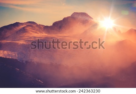 Sunny Winter Mountain Landscape with Blowing Snow. Colorado Rocky Mountains, Colorado, United States.