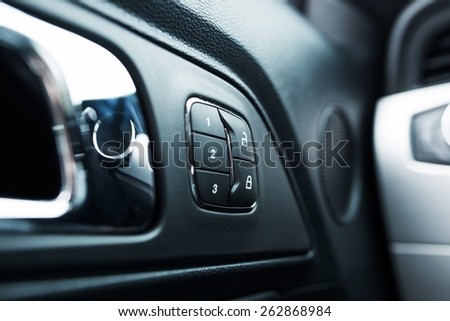 Car Door Lock and Seats Adjustment Memory Closeup Photo. Modern Transportation.
