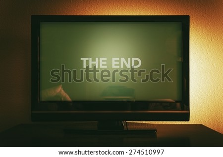 The End of Television Photo Concept. Flat Screen Television Displaying The End information.