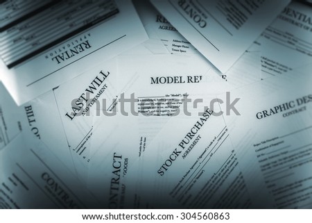 Pile of Legal Documents Closeup. Contracts, Releases and Applications.