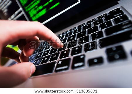 Computer Works. Hand on Laptop Keyboard Closeup. Computer Technologies.