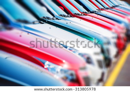 Colorful Cars Stock. Cars For Sale. Dealer Lot Cars Row.