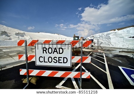 Road Closed. Colorado Mountain Road Closed Due to Large and Dangerous Snowfields. Colorado High Mountain Road Closed.