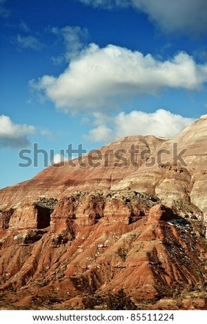 Rocky Utah Landscape and Blue Cloudy Sky. Vertical Photo. Utah Rocks Formation. Utah, USA