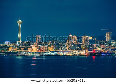 Part of the Seattle Skyline in the State of Washington, United States. Seattle Skyline and the Bay During Night Hours.