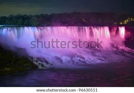Niagara Falls at Night. Illuminated Waters of Niagara Falls. Photography Taken from Canadian Side. Niagara Falls, Ontario Canada.