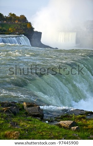 American Falls - Niagara. Taken from American Side. Niagara Falls, USA, NIagara Falls, Ontario, Canada. United States and Canada Border. Vertical Photo