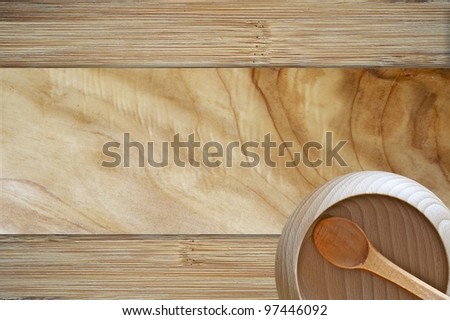 Wood Bowl Background. Wood Background with Wood Bowl and Spoon - top View. Raw Wood Kitchen Equipment. Organic Cooking Theme